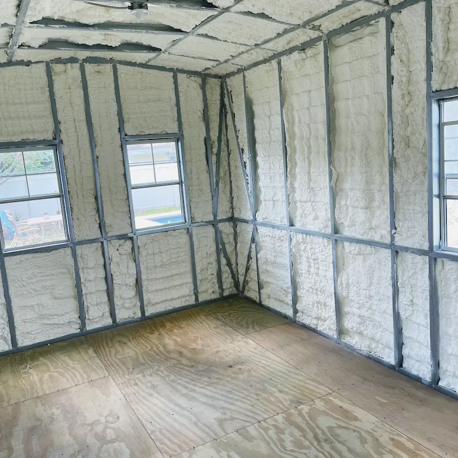 Closed-cell spray foam insulation applied to wall cavities in a residential project in Lakeland